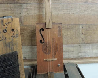 Fretless 3 string Cigar box guitar with "F" Hole!